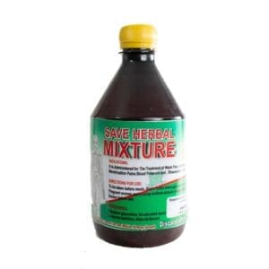 A bottle of liquid that is sitting on the floor.