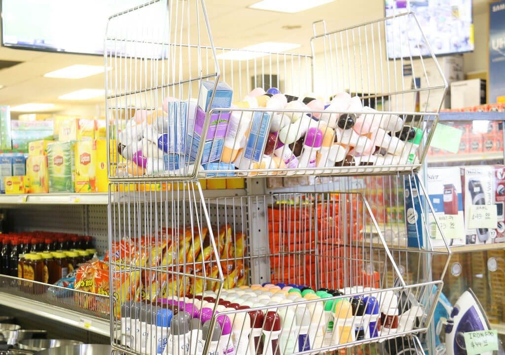 Wire display of deodorants and snacks