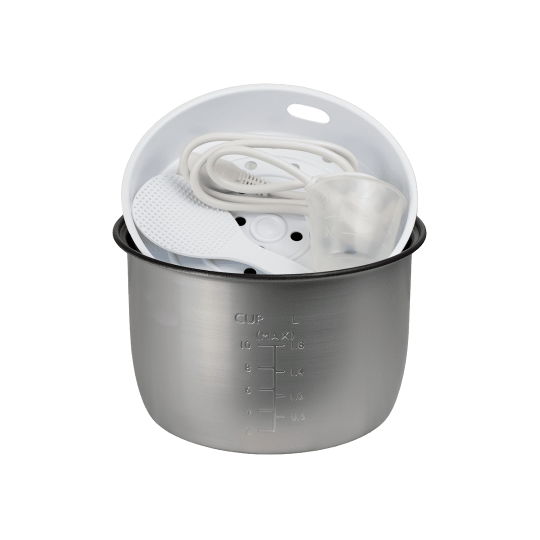 Rice cooker accessories in a metal pot.